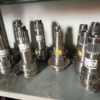 Trục tampet xúc lật